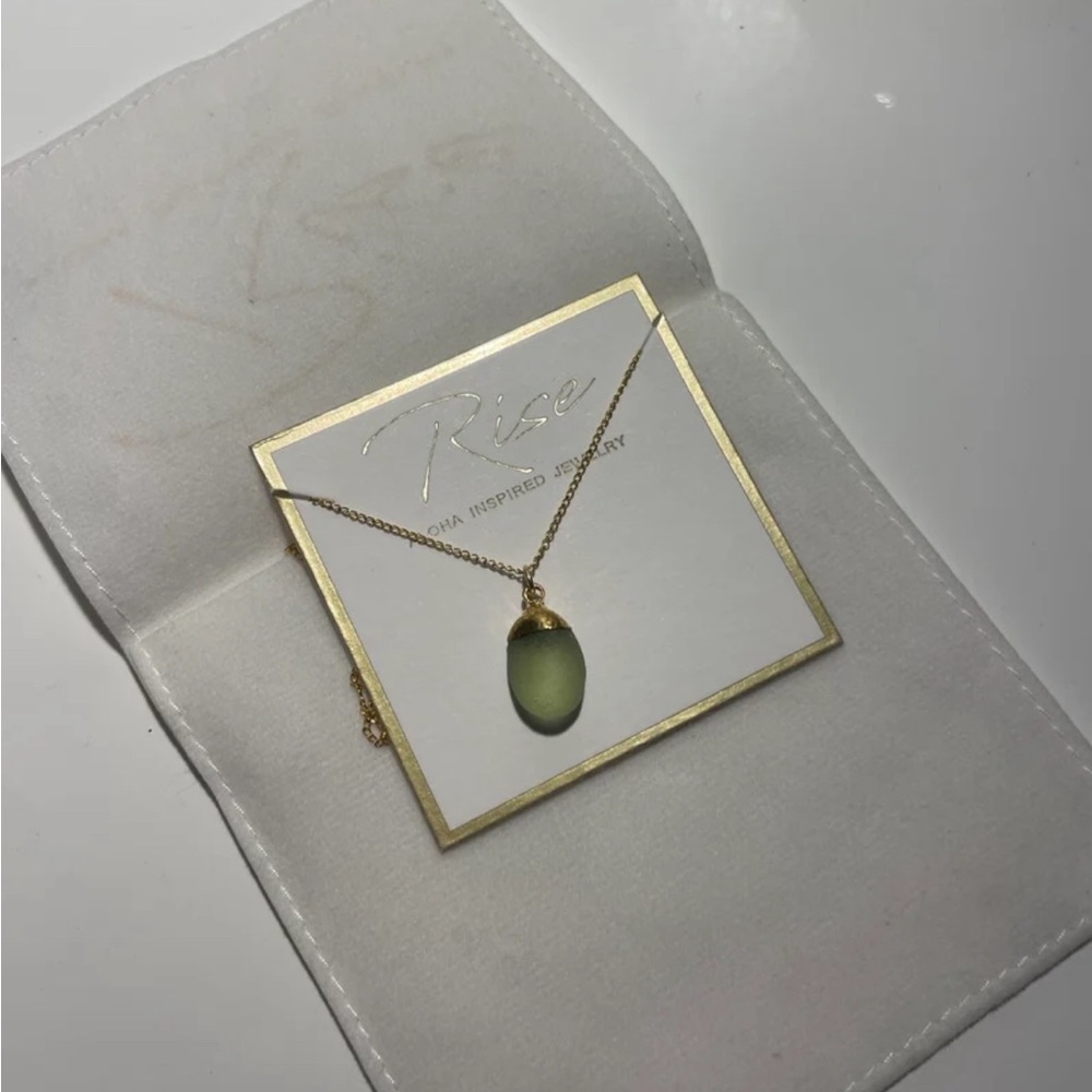 24k gold dipped glass necklace
Never used 
Made and sold out of Hawaii